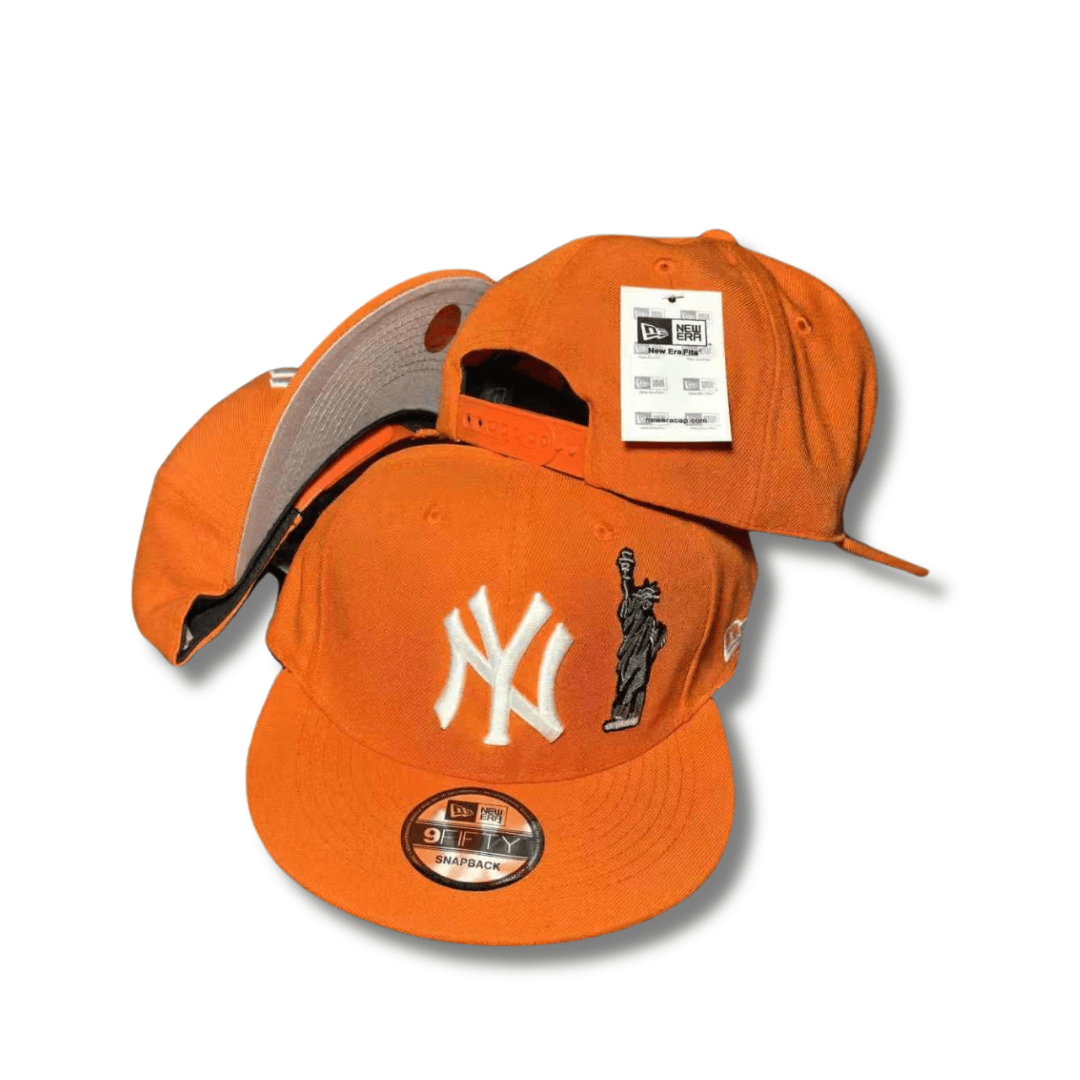 New York Yankees Orange with Statue of Liberty Design and White Embroidered Logo Snapback Cap