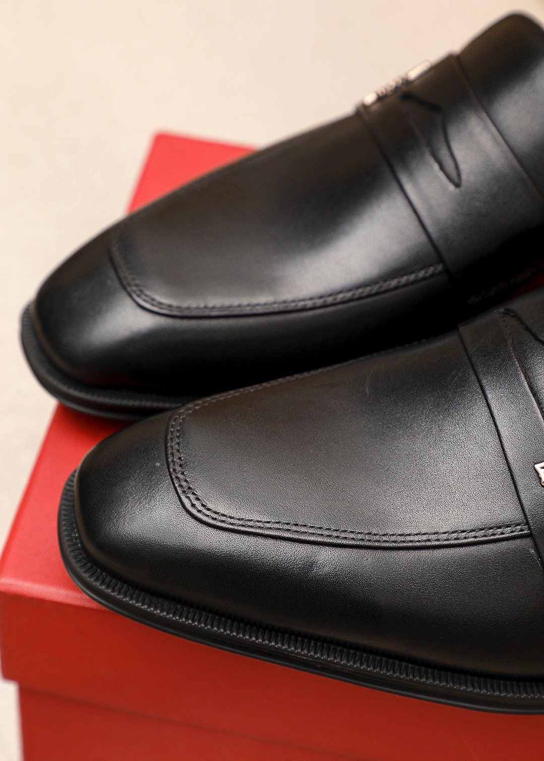 Ferragamo Black Metal Accent Loafers — detail