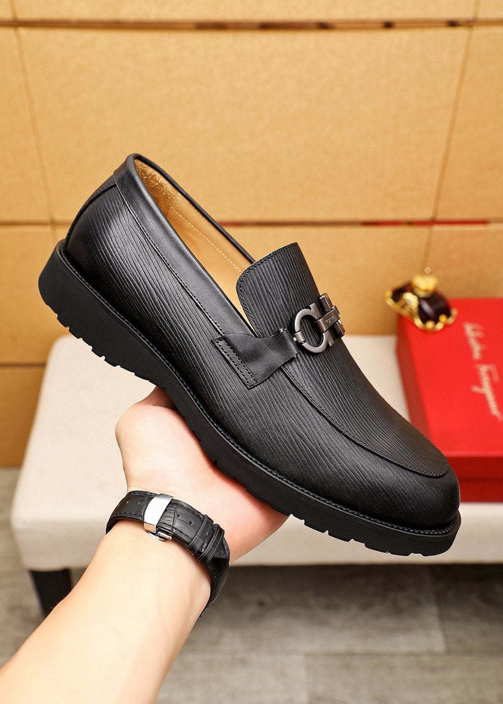 Ferragamo Black Textured Bit Loafers — model