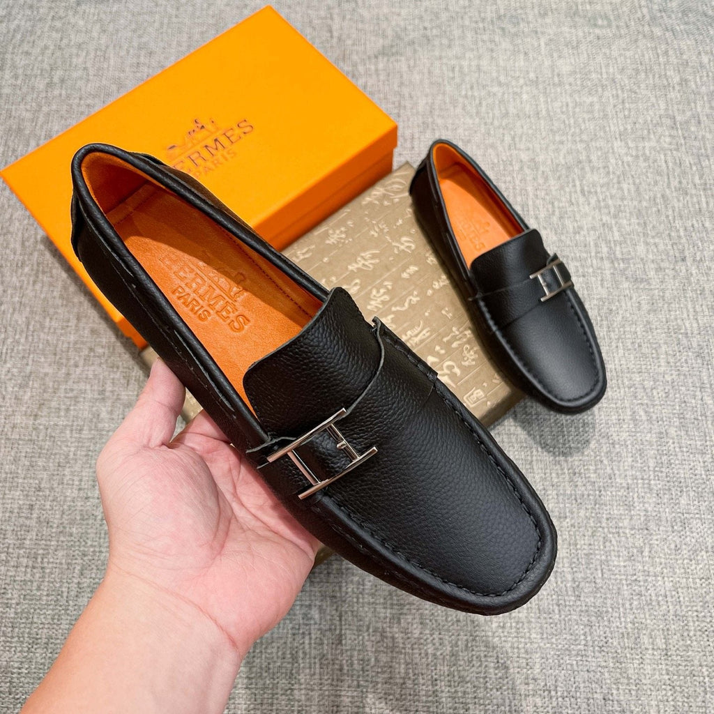 Hermès Black Bar Loafers — model