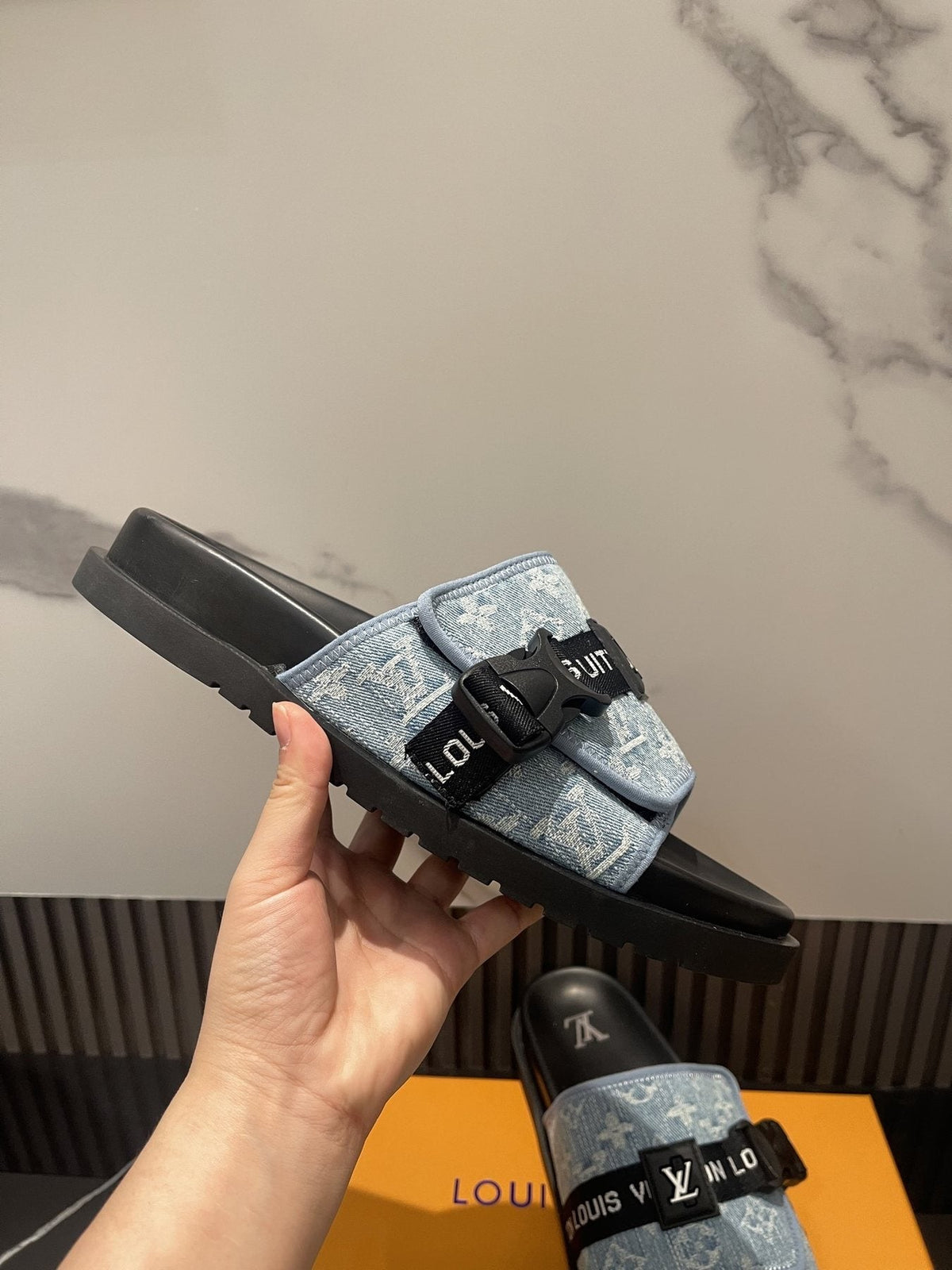 Louis Vuitton Light Blue and Black Slide Sandals — model