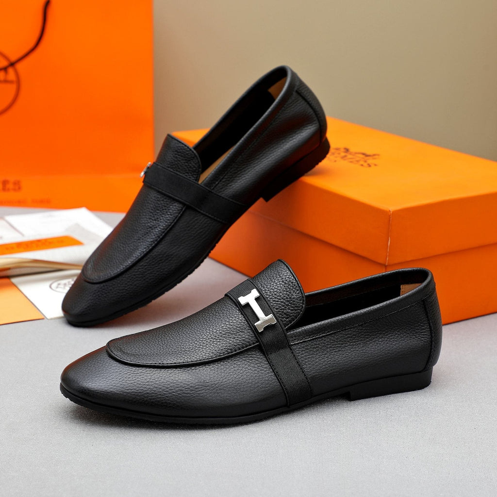 Hermès Black Pebbled Leather H-Hardware Loafers — front