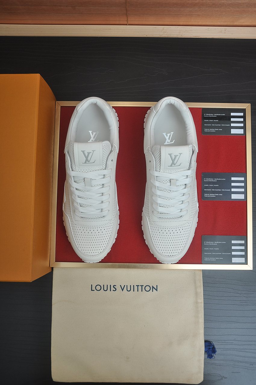 Louis Vuitton White Perforated Low-Top Sneakers — front