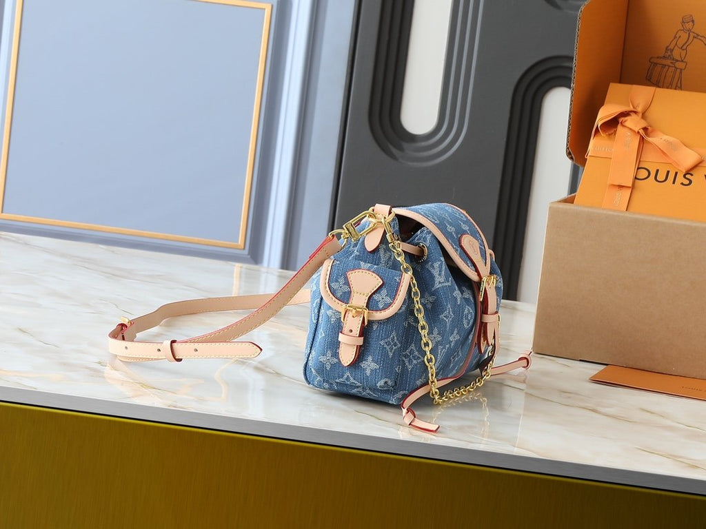 Louis Vuitton Odyssée Backpack Handbag — side