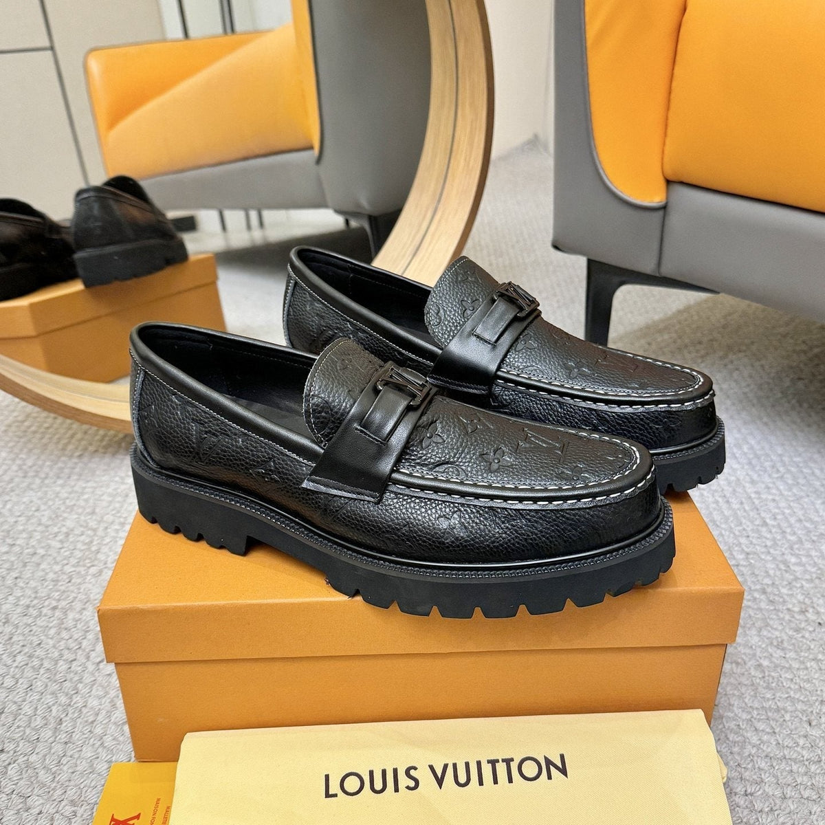 Louis Vuitton Embossed Lug Sole Loafers — side