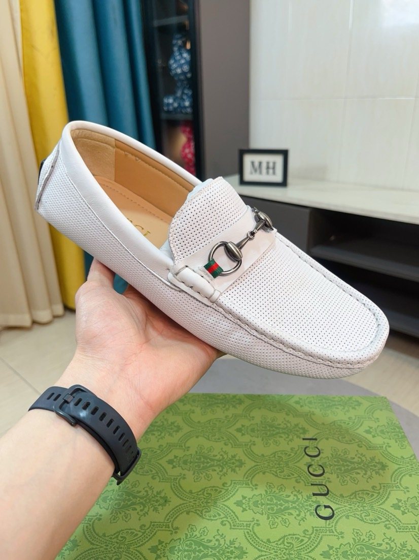 Gucci Perforated Metal Hardware Loafers — front