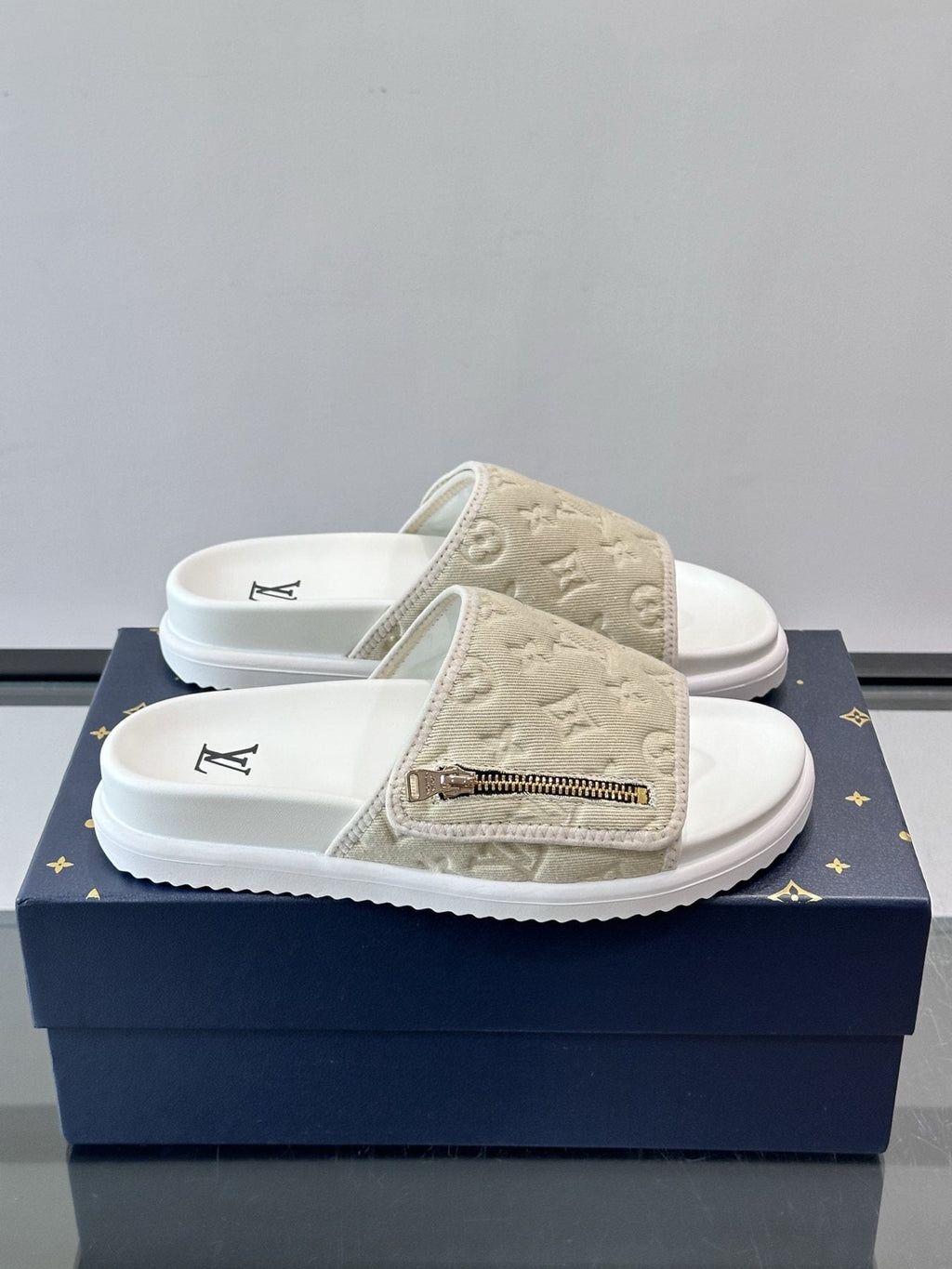 Louis Vuitton Embossed Monogram Slide Sandals — front