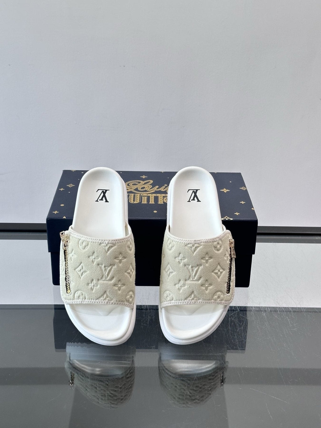 Louis Vuitton Embossed Monogram Slide Sandals — front