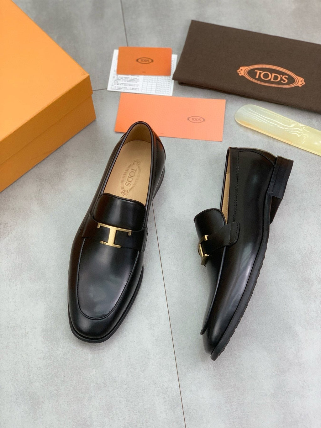 TOD'S Black Gold-Tone Hardware Loafers — front