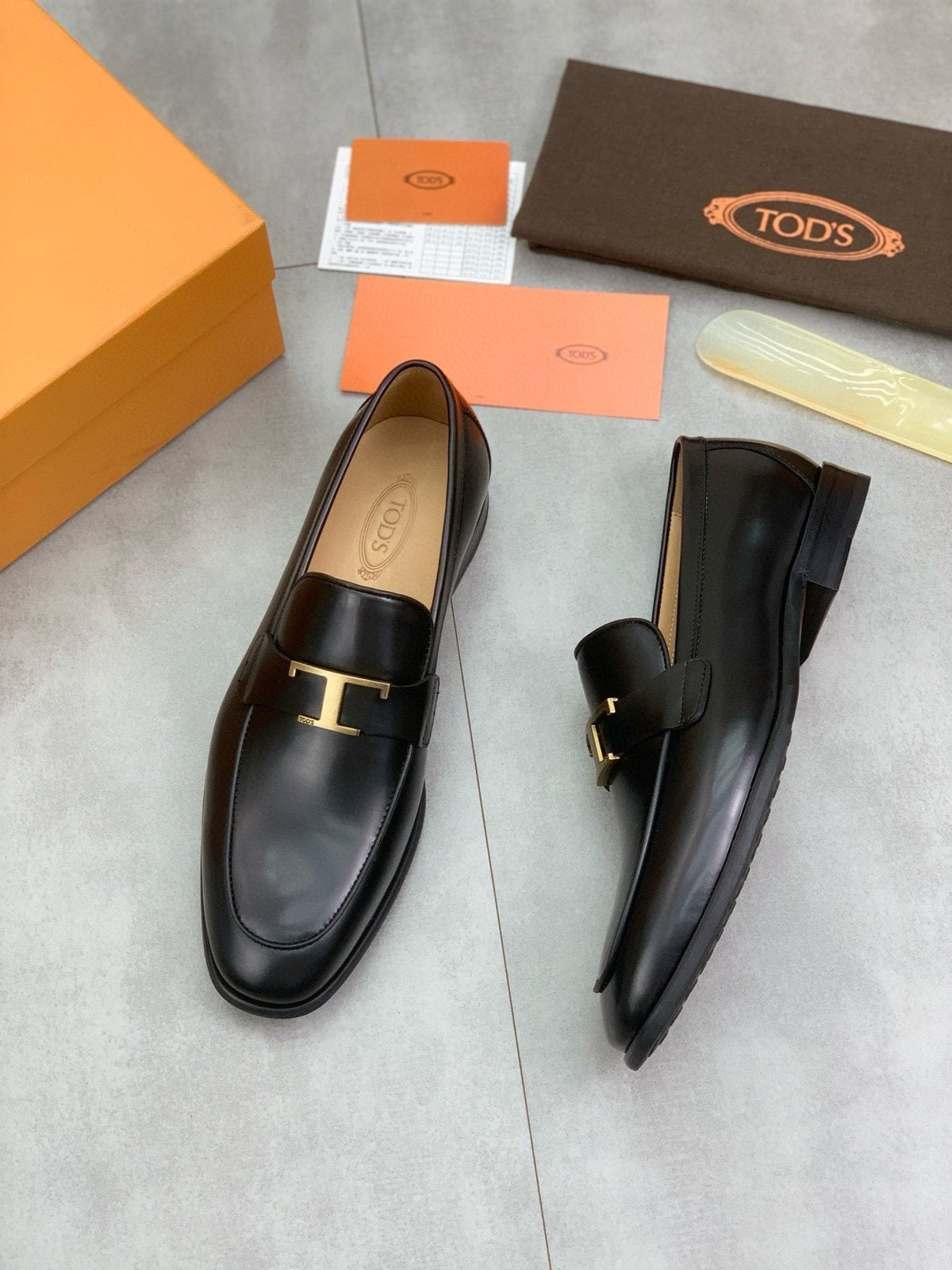 TOD'S Black Gold-Tone Hardware Loafers — front