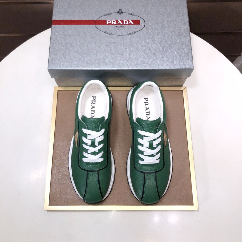 Prada Triangle Plaque Low-Top Sneakers — front