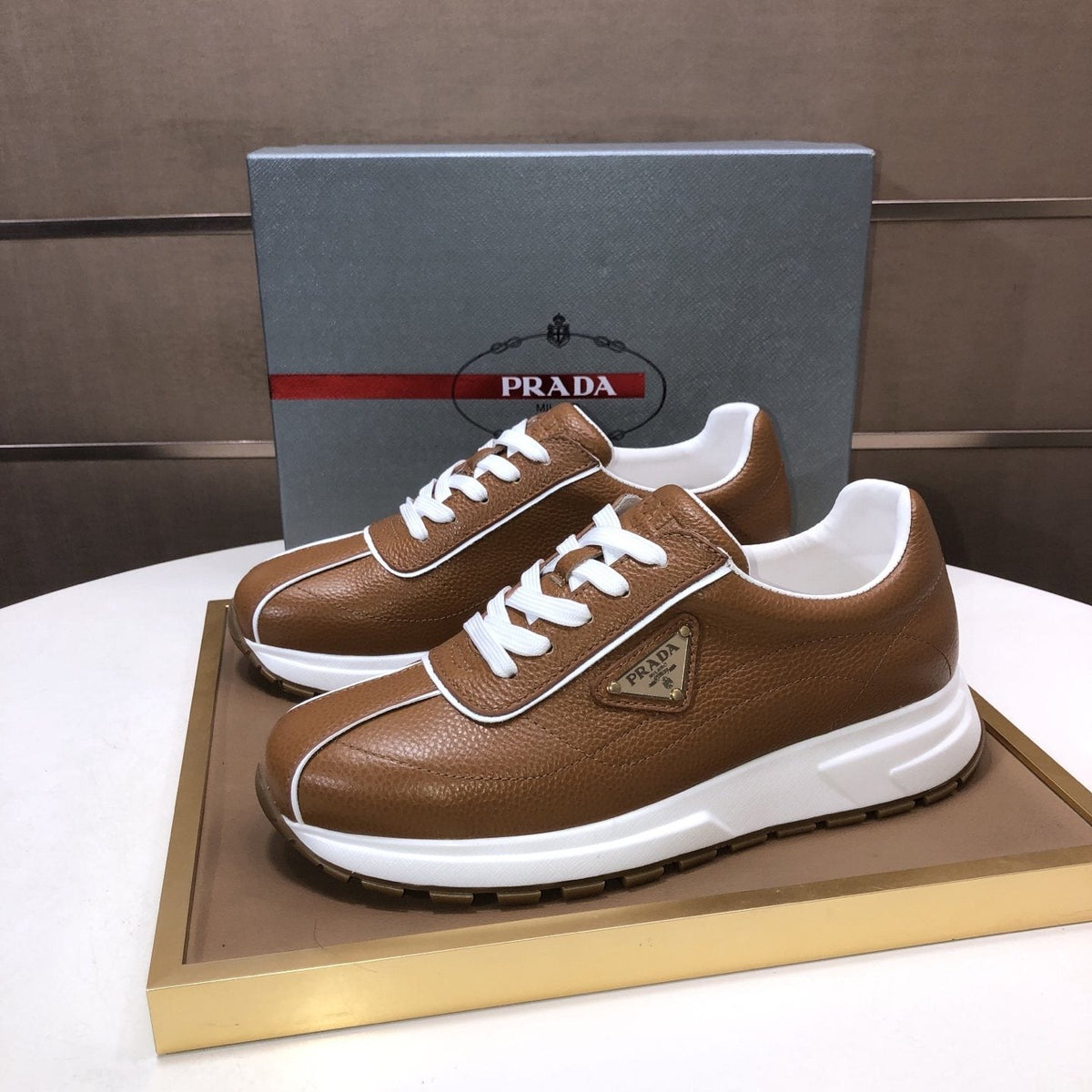 Prada Triangle Plaque Low-Top Sneakers — front