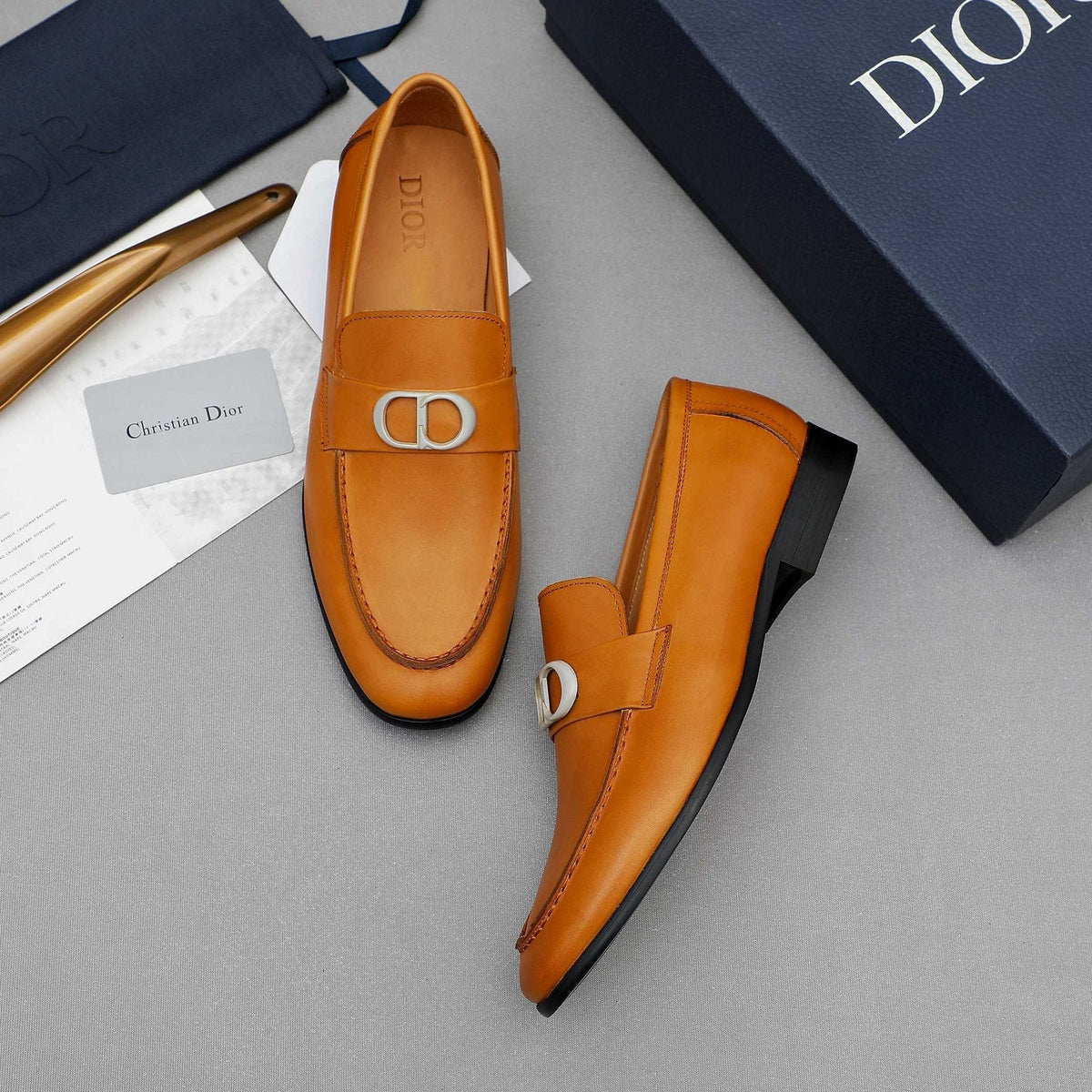 Dior Double-Ring Buckle Loafers — model