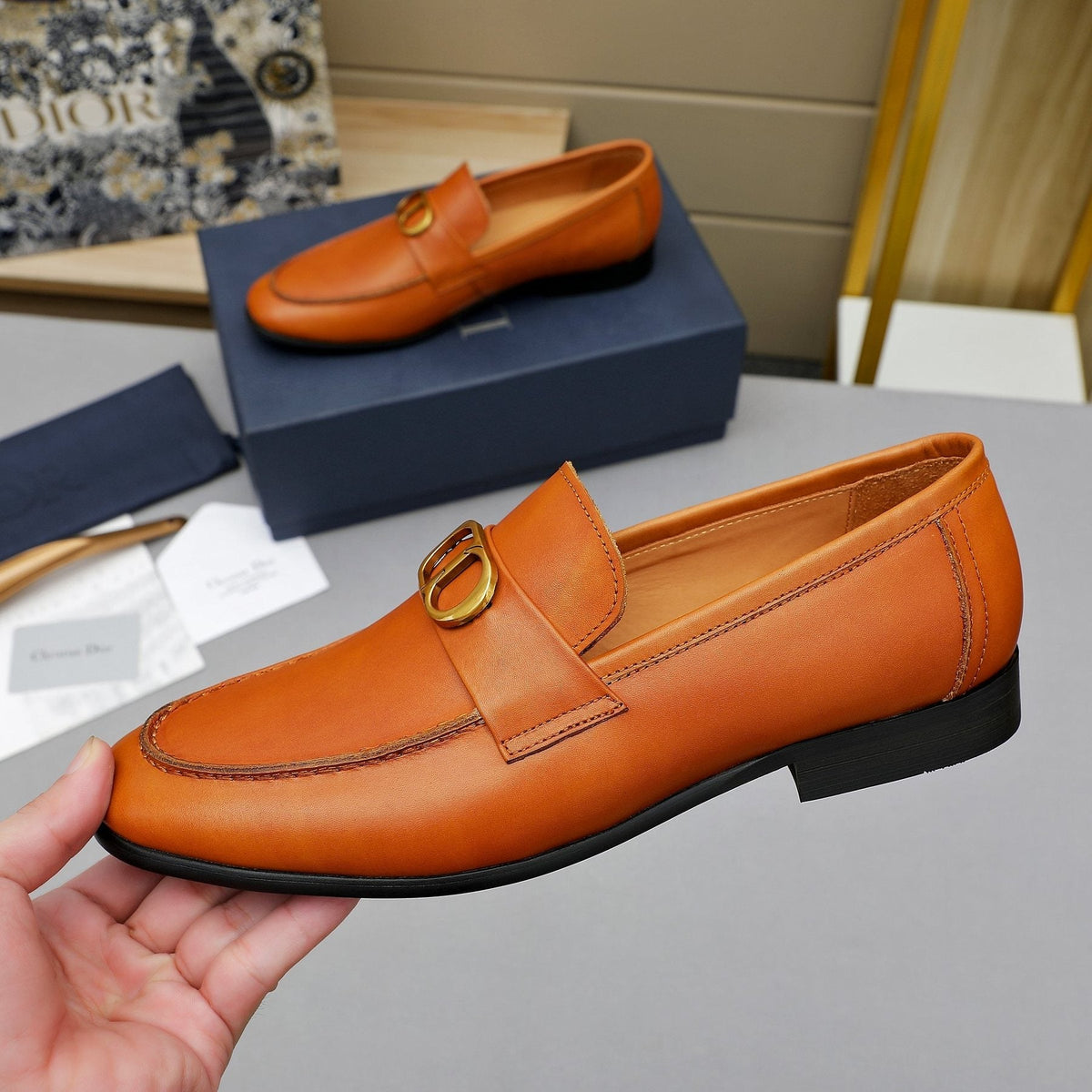 Dior Double-Ring Buckle Loafers — model