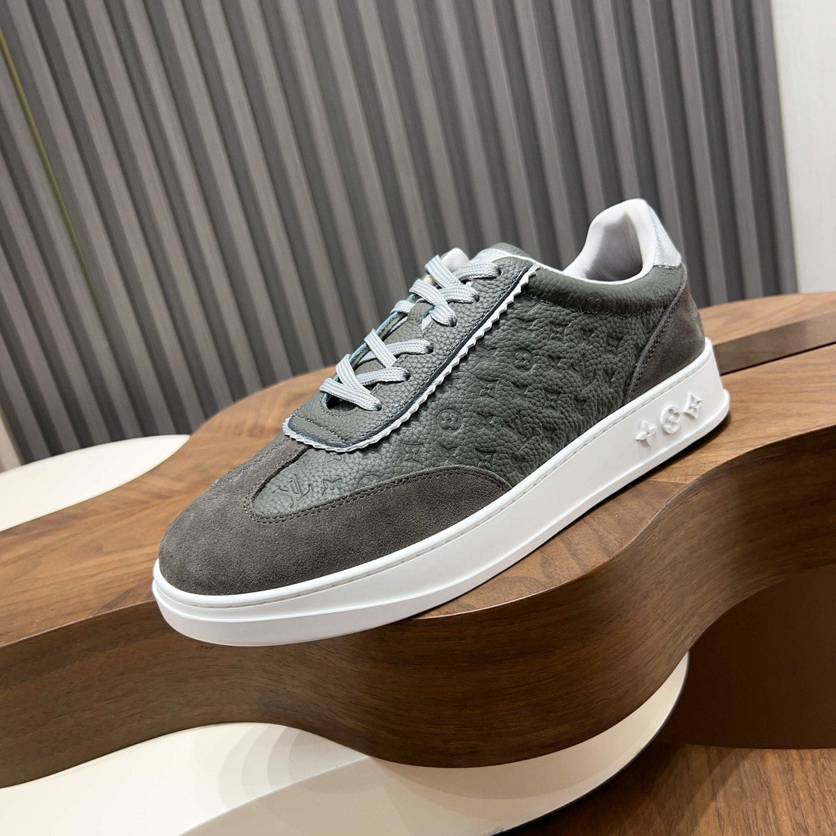 Louis Vuitton Embossed Low-Top Sneakers — side