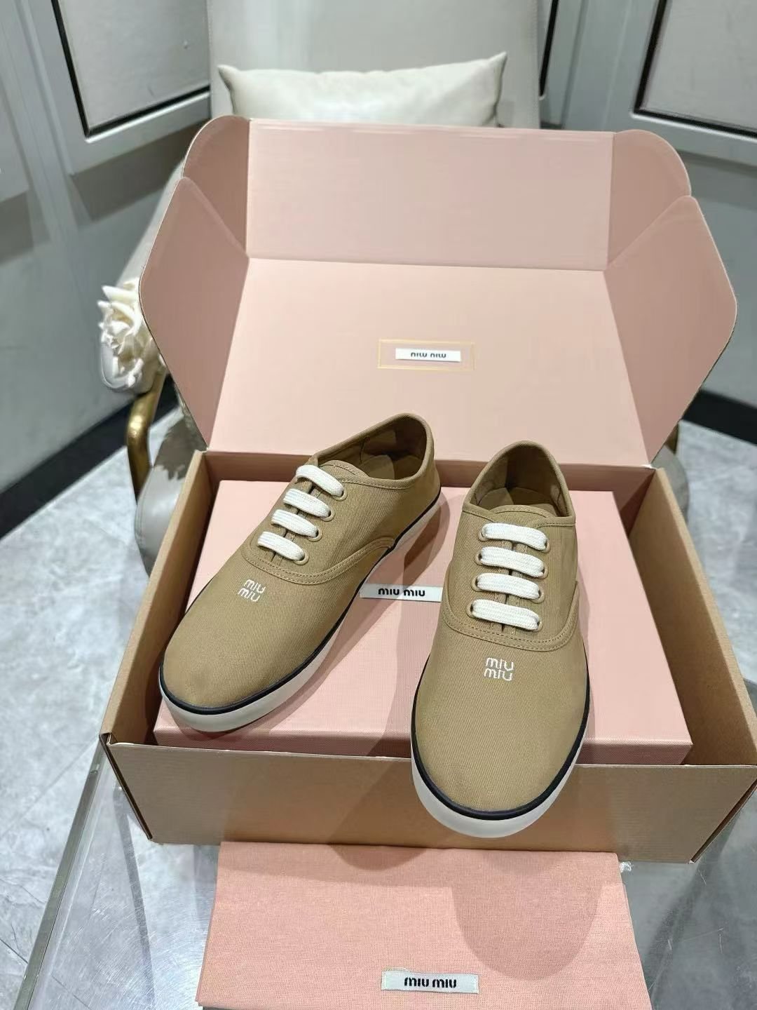 Miu Miu Low-Top Canvas Sneakers — front