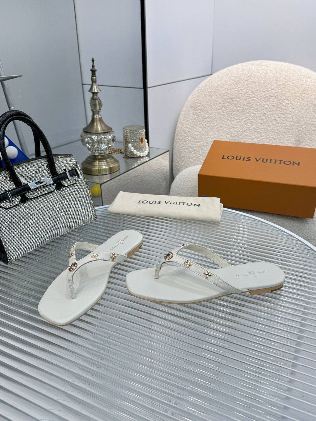 Louis Vuitton Metal-Detail Thong Sandals — front