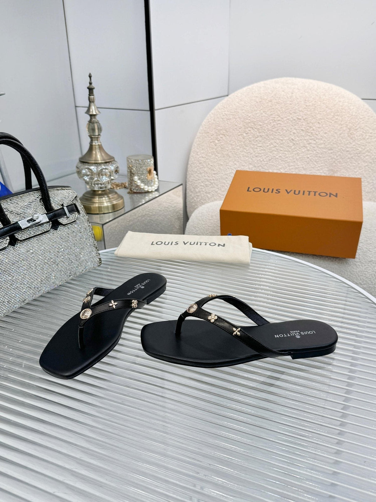 Louis Vuitton Metal-Detail Thong Sandals — hero