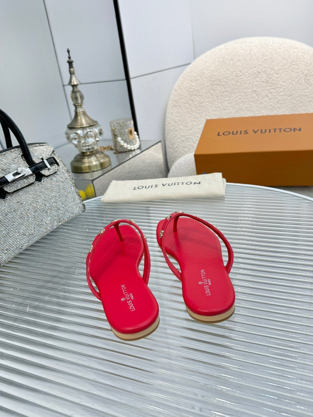 Louis Vuitton Metal-Detail Thong Sandals — front