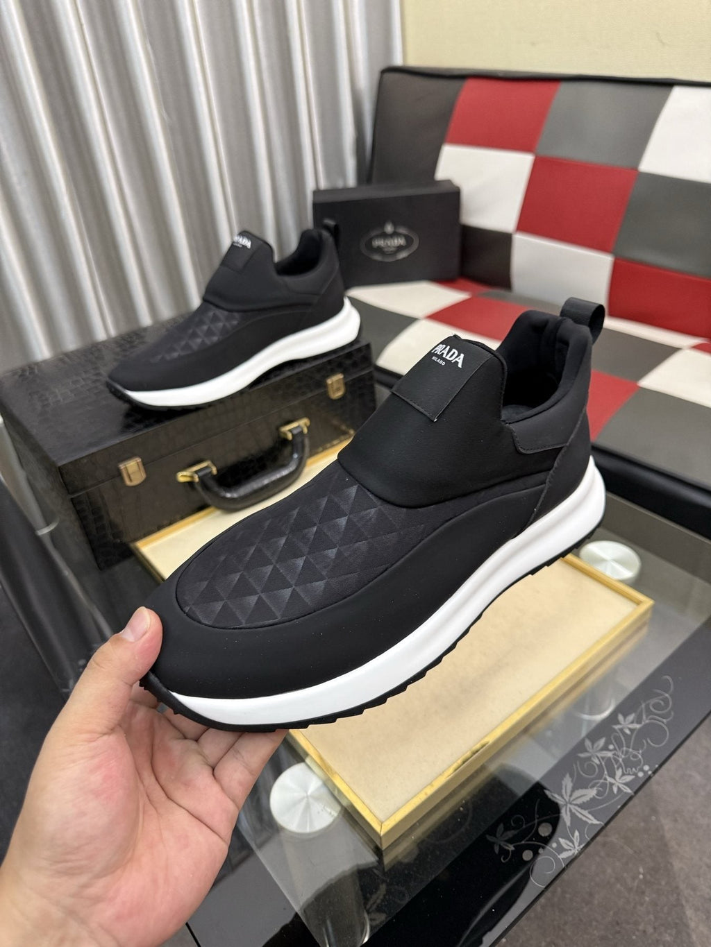 微商相册测试鞋子-Prada Black Quilted Slip-On Sneakers — front